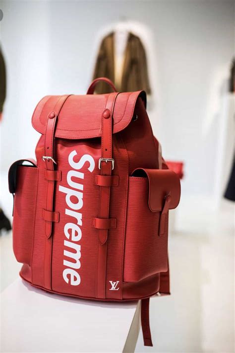 supreme lv duffle bag fake|false supreme x lv backpack.